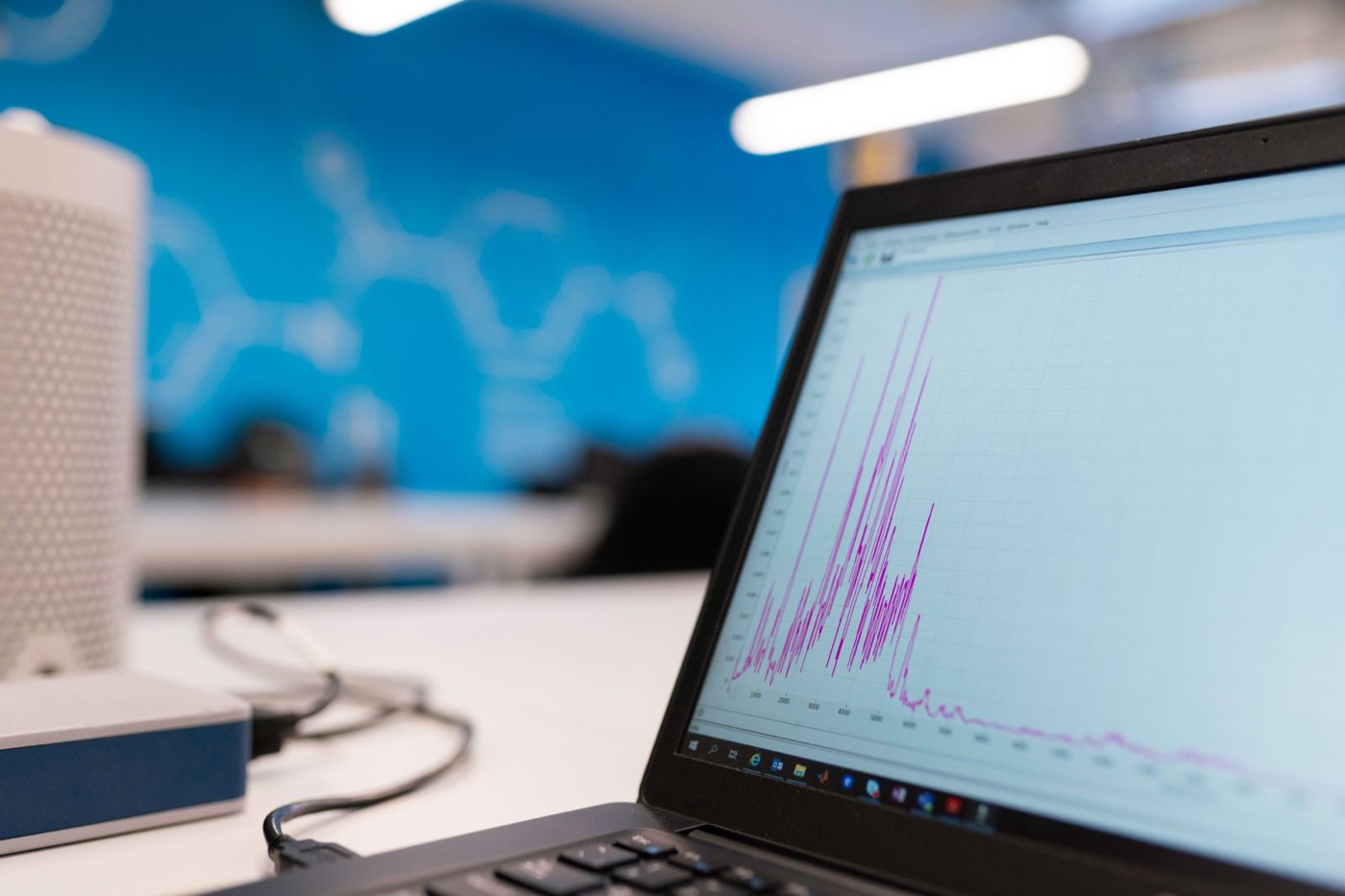 A laptop screen showing a progress analytics graph